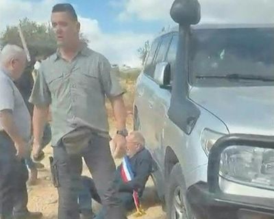 Guardian reporter filmed masked militants seconds before West Bank attack on French mayor