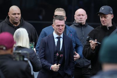 Tommy Robinson arrives at court ahead of harassment trial