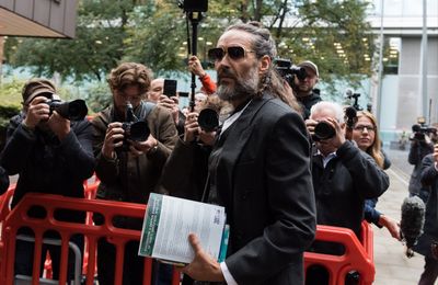Russell Brand prays before court