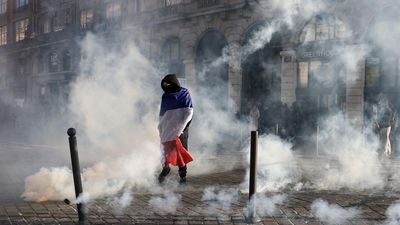 French PM calls for partial curfews after weekend of violence and looting