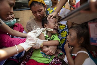 Nearly Always Fatal Measles Brain Disease Struck Some Philippine Children Just Two to Three Years After Infection