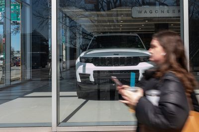 New car loan payments hit record highs as Americans take on more debt