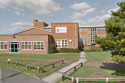 Teacher banned from classroom after swearing at pupil and pushing him against wall