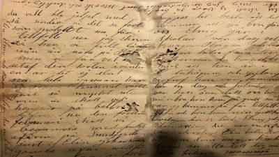 A couple found a sealed 112-year-old letter hidden inside their Illinois home’s wall