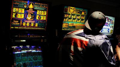 'Reverse ATMs': pokies panned for harm as reforms urged