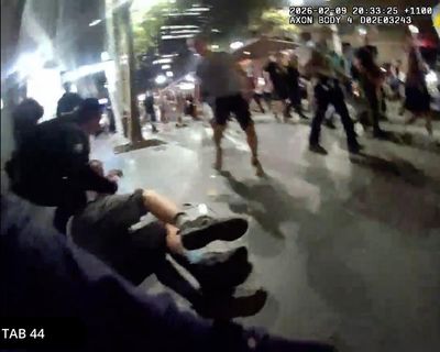 Bodycam video shows police officer shoving Herzog protester before ‘I punched him in the head’ boast
