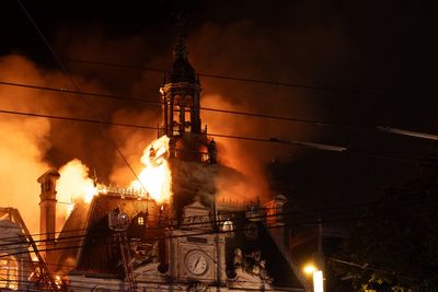 Man arrested after historic town hall in France burned down during night of riots and looting