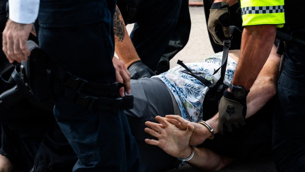 Long Beach Residents Block ICE Vehicles With Trash Cans After US Citizen Suffers Broken Arm in Raid