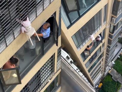 Watch: Toddler left alone at home dangles from 12th-floor window in China, neighbours hold stool to save her