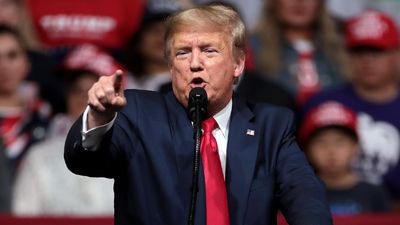 MAGA Supporter in 'America First' Cap Caught Shaking His Head at Donald Trump's Rally Claims