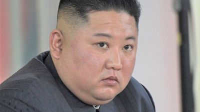 Photos of Kim Jong-un inspecting children’s shoes released by North Korea as proof he’s alive, but people online have their doubts
