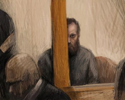 Brendan Nugent stares in silence as a court hears about his alleged attack on Helen Haines