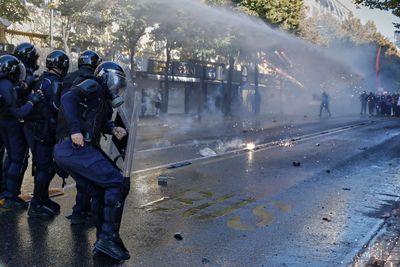 Albanian police clash with anti-government protesters for an 8th day