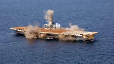 Sinking Of USS Oriskany: Navy reef sinks carrier for divers; NOAA study tracks fish impact