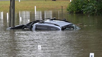Motorists rescued as 'perfect storm' sparks flooding