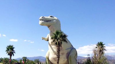 Roadside Dinosaur Becomes Landmark: Claude Bell sculpts Dinny from salvaged steel; Hollywood fame follows