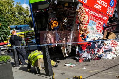 London tour bus crashes into souvenir stand near Trafalgar Square