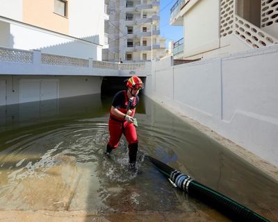 Severe flooding in eastern Spain and UK hit by first named storm of winter