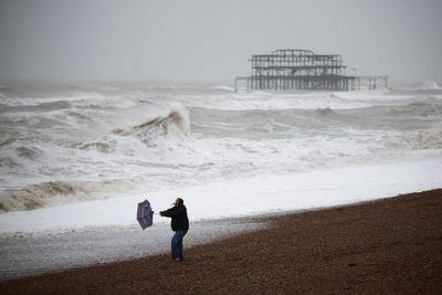 Section of historic pier falls into sea as Storm Austen hammers UK with 110mph winds