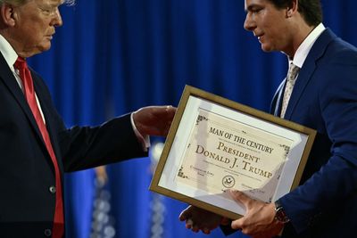 'Man of the Century': Iowa Candidate Hands Trump a Homemade Award in Viral Midterm Moment