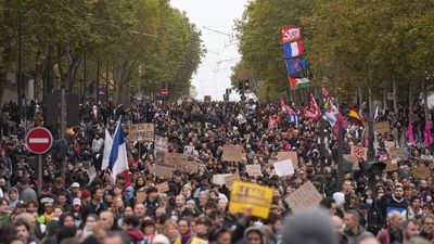 Paris march ends in clashes after largely peaceful protests across France