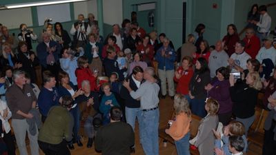 New Jersey mayor charges at a resident during a township meeting, saying he was protecting his wife and daughter in a clash the resident disputes