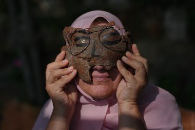 Lebanese artist turns shrapnel from Israeli munitions into art, in photos