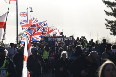Hundreds join anti-migrant march near planned immigration removal centre
