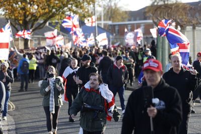 Anti-migrant protesters gather near planned immigration removal centre in Gosport