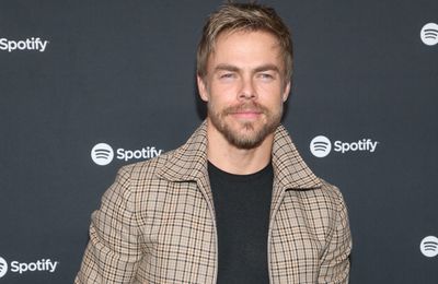 Derek Hough mourns beloved dog Romie in emotional tribute after his death
