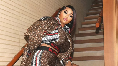 Nicki Minaj Appears To Struggle Walking Down the Steps While Disembarking President's Air Force One