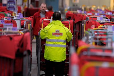 Postal shake-up paused as Royal Mail braces for Christmas peak