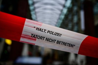 Several injured after BMW rams into crowd in Germany as suspect remains at large