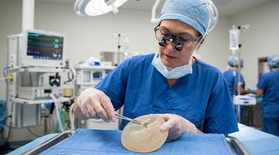 A 40-Year-Old Breast Implant Filled with Salmonella After a Dog-Walk Pop, the Third Reported Case