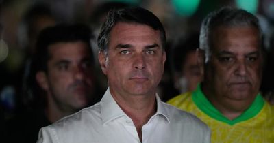 Defeated presidential candidate arrives in US after Brazil cancels his passports