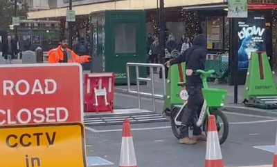 Moment cyclist ignores Oxford Street ban as enforcement officer appears helpless to stop him