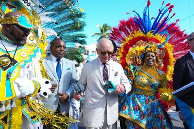 King Charles shakes maracas at Bahamas carnival parade amid slavery reparations protest