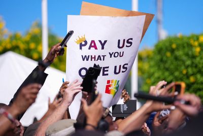 Protesters demand 'pay us what you owe us' as Charles joins Bahamas parade