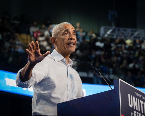 Trump and Obama trade barbs on campaign trail in final days before midterm election  – US politics live