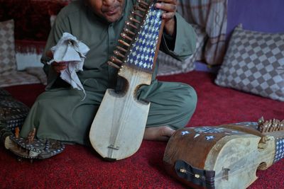 In Afghanistan, musicians defy music ban to keep traditions alive