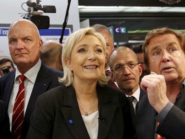 Marine Le Pen retains lead in French presidential election polls despite gains by Emmanuel Macron