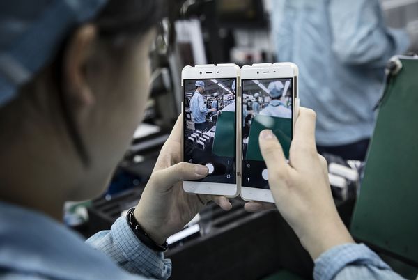 China’s Consumers, Factories Hold Up as Property Starts to Cool