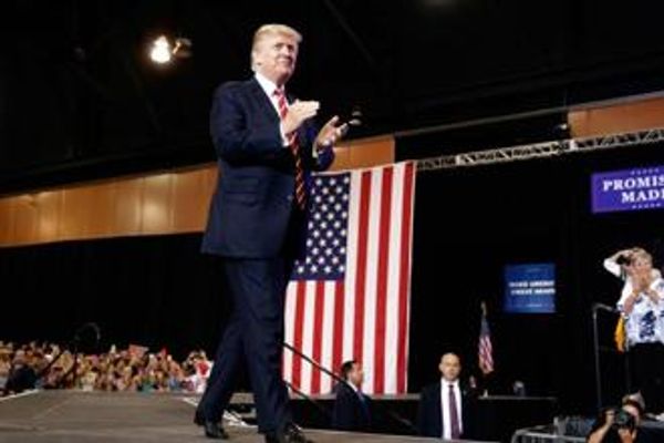 Donald Trump defends Charlottesville response at raucous Phoenix rally