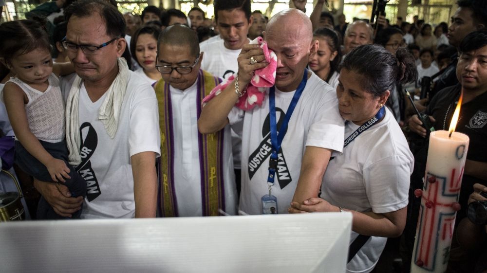 Thousands attend funeral for slain Philippine teenager