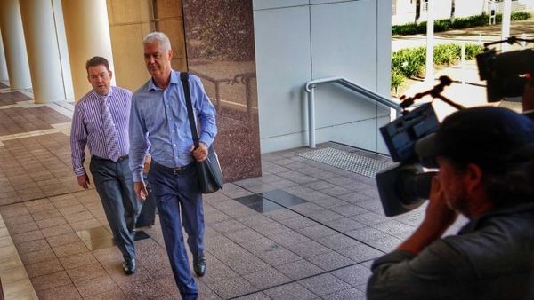 Intimate texts between former NT police commissioner and fraud target read in court