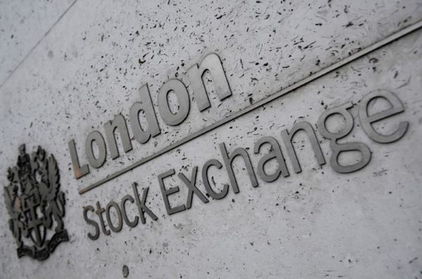 Global stocks hit two-week high, led by banks ahead of earnings