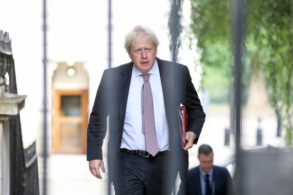 May Fights to Contain Brexit Crisis After Key Ministers Quit