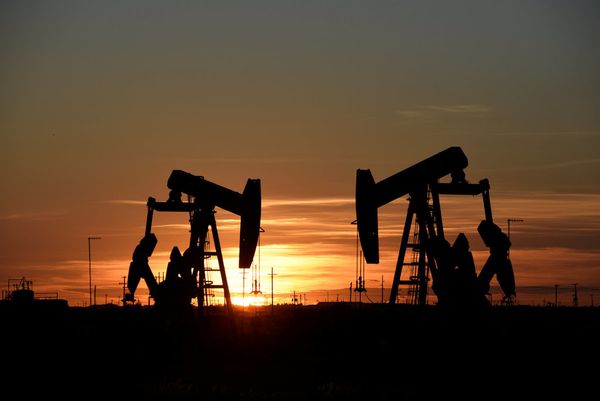 Oil turns lower as weaker demand outlook weighs