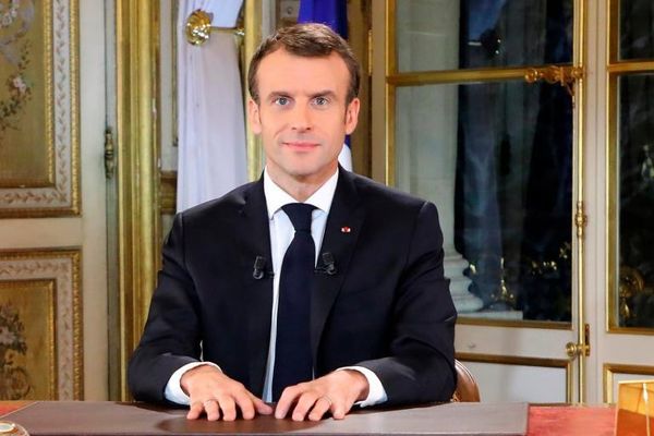 Emmanuel Macron caves in and offers minimum wage rise after Yellow Vest protests spark violence across France