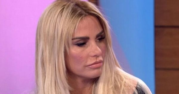 Katie Price shows off flat tummy and perky boobs after…